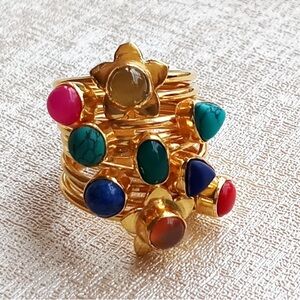 Elegant Gold Ring Set with Colorful Gemstones